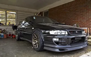 56043